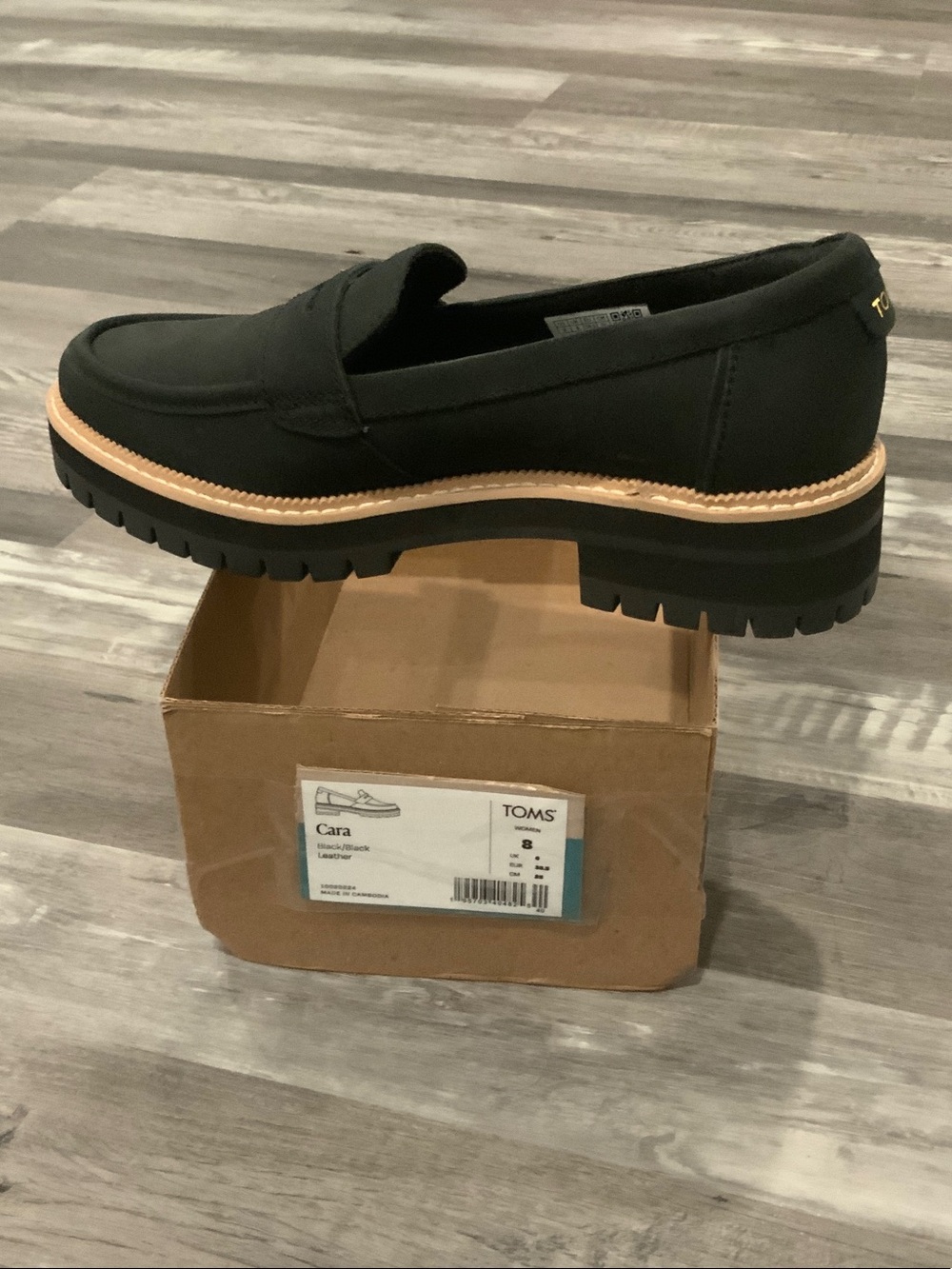 Toms Black Leather Penny Loafer with Tan Trim
